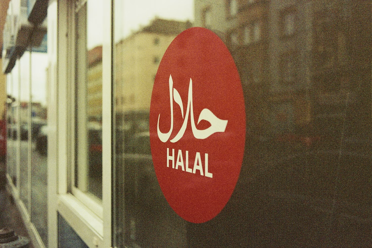 Traveler checking halal-certified products on a smartphone in Thailand
